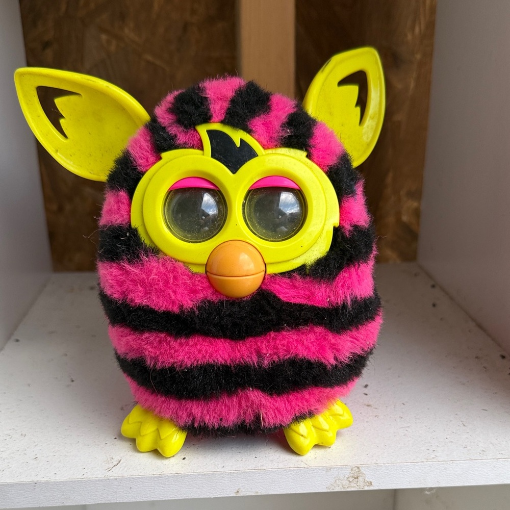 Vibrant Pink and Black Striped Plush Toy